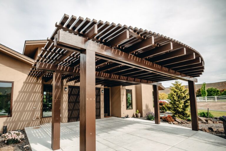 brown pergola installed by Patio Covers Unlimited