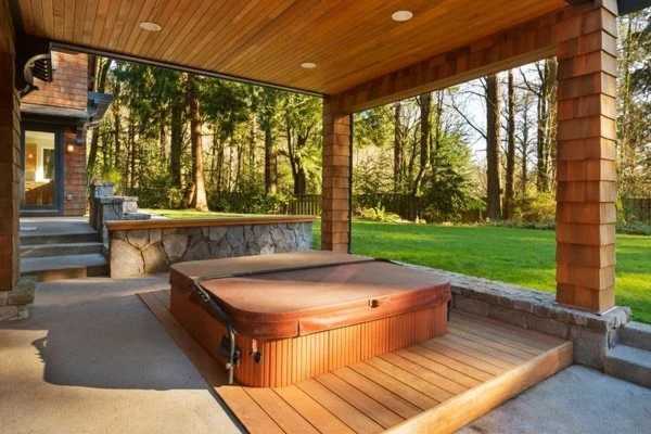wood deck with a hot tub PCUNW