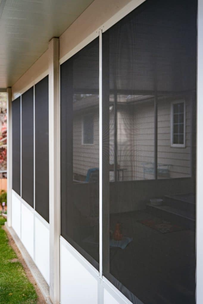 a photo of an exterior view of a screen room